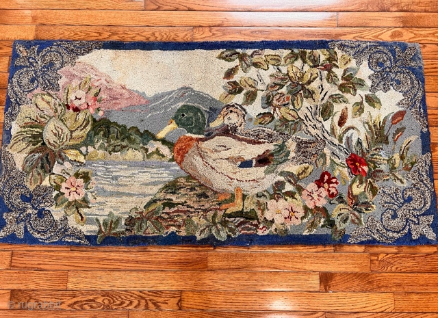 Antique American Hooked rug in excellent condition Most likely from New England area. 
Size:54" X 26"
Please contact me via E-Mail at: zhirpour@gmail.com           