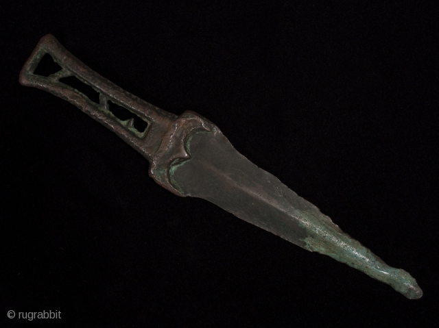 Dagger thokcha, Tibet. Bronze with verdigris. 10" (25.5 cm) long. 3rd-4th century BCE.                    