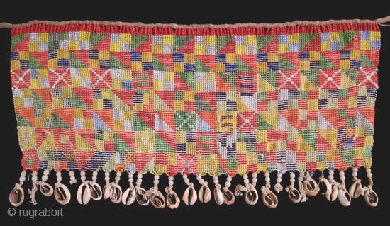 A cache-sex, or pikuran, from the Kirdi people of Cameroon. 19" wide (48 cm). Mid-20th century.                 