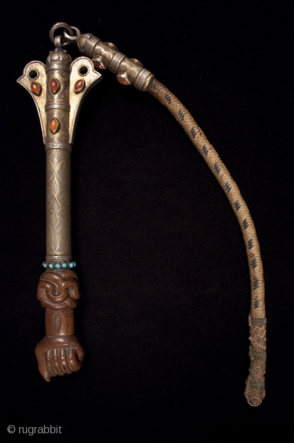 Quirt (horse crop).
Yamut, Turkoman, Central Asia.
Wood, silver, turquoise, carnelian, leather, gilding.
25" (64 cm) long.
19th century.
#9773
                  