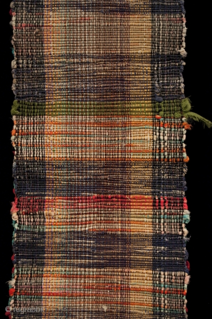 Sakiori obi, Japan. Made from old cotton fabric, this example has bands of brick red and aqua with some orange bands mixed in at the ends. One end has a more subtle  ...
