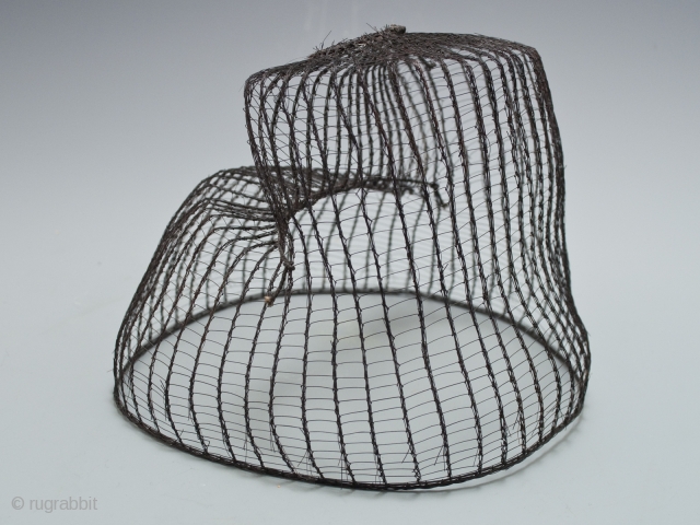 Horsehair Hat, Korea.
22" (56 cm) in circumference, 5" (12.7 cm) high
Late 19th to early 20th century
Ex Fifi White collection, California 
These hats were worn by noblemen to contain their hairdo beneath a  ...