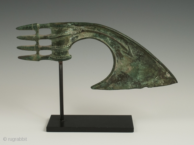 Axe head, Luristan area, Western Persia. Bronze. c. 1200-800 BC. 3-3/8" (8.5 cm) high, 8.25" (20.8 cm) wide. This elegant bronze axe head was likely used as a ceremonial weapon. It has  ...