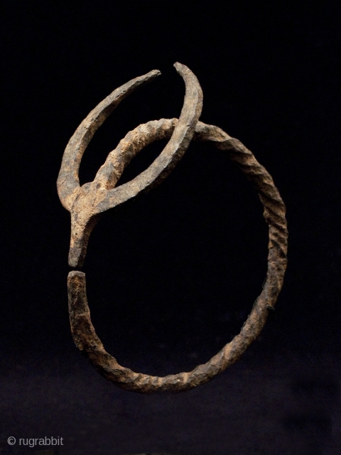 Iron Bracelet. Senufo, Ivory Coast, West Africa. 10" (25 cm) in diameter.
Early-mid-20th century. ex Maine Durieu, Paris.
                