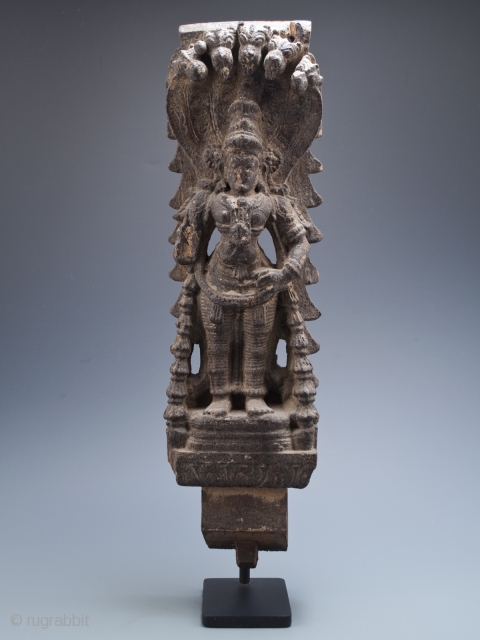 Temple carving of, most likely, Vishnu from Kerala, India.
Carved wood.
18" (45.7 cm) high, 20" (50.8 cm) with base, 5.5" (14 cm) wide
16th to 17th century
#7680        