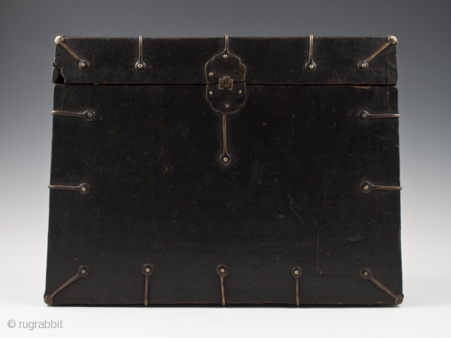 Black box, Tibet.
Wood, fabric, brass.
8" (20.2 cm) high, 10.5" (26.2 cm) wide, 5" (12.7 cm) deep.
Late 19th to very early 20th century.
This fabric-covered wood box tapers slightly toward the top, as seen  ...