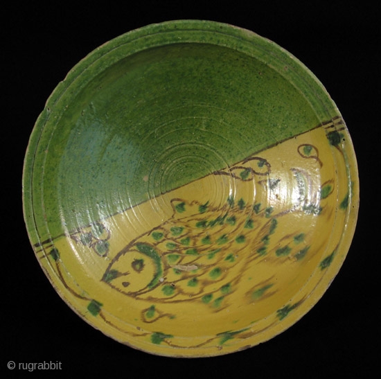 Large bowl, chqâla. Nabeul, Tunisia. These were used at family dinners, often containing the couscous. It is said that the fish motif and the yellow/green colors symbolize water and freedom. 16.5” in  ...