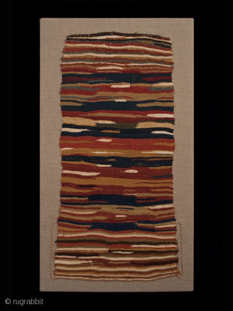 Pechera (chest panel). Sihuas Valley, Peru. A.D. 200-400. Original condition,  Camelid wool. 28" (71 cm) high by 13" (33 cm) wide. Professional mount measures 31" (79 cm) by 17" (43 cm). 