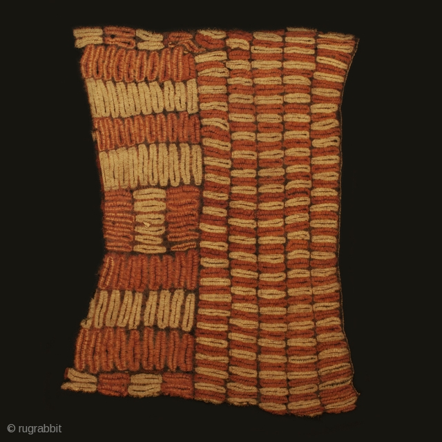 Man’s mantle, Dida people, Ivory Coast. Raffia fiber, natural dyes, 56″ by 42″  (142 by 107 cm). Early 20th century

This large ceremonial mantle is woven of raffia fibers, then resist-dyed three  ...