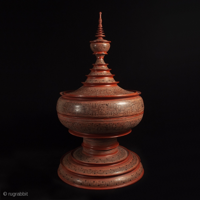 Large offering vessel, hsun ok, Pagan, Burma. Bamboo, lacquer, pigment, 33″ high by 18″ diameter (84 by 45.7 cm), Late 19th or early 20th century.

An imposing offering vessel composed of six pieces,  ...