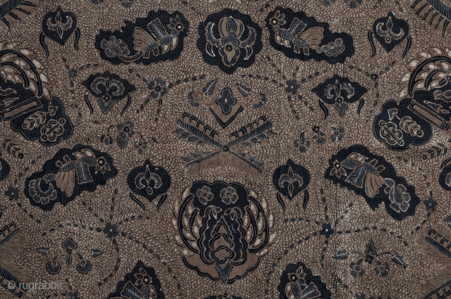 Batik Kain,
Solo, Java,
Cotton,
Mid-20th century,
99.5" (272.7 cm) by 42" (106.7 cm).
The hand drawn (tulis) pattern of this batik is called satrio manah and symbolically represents a knight shooting arrows. There are no holes  ...