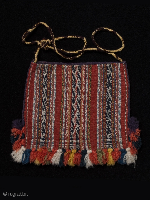 Chuspa (coca bag),
Department of Potosi, Bolivar Region, Bolivia.
Wool,
20th century,
7" (17.7 cm) high by 7.5" (19 cm) wide.
Plain weave coca bag, with pattern bands of double-faced weave using complementary warp sets and double  ...