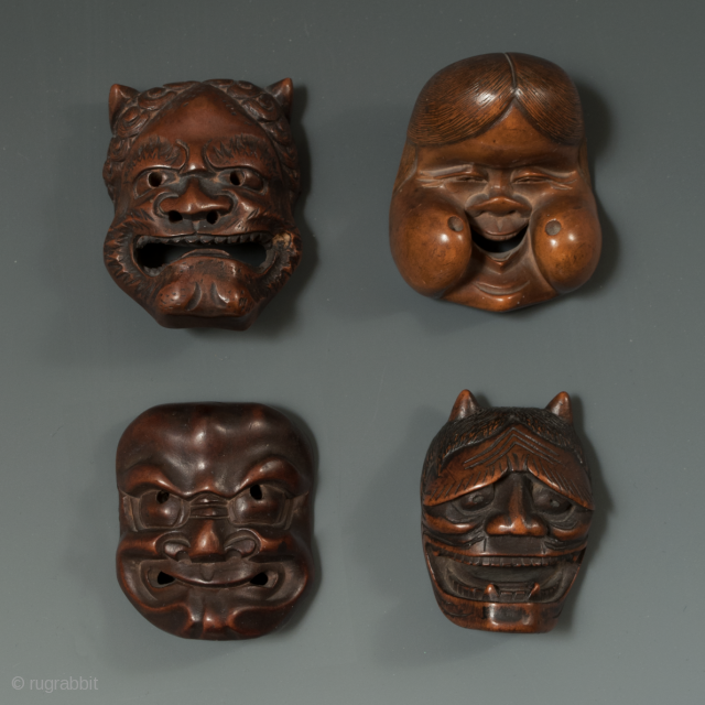 Carved wood netsuke of Oni, Okame, Beshimi and Hannya, Japan. 1.75" (4.5 cm) to 1" (5 cm) high. Meiji Period 1868-1912 
           