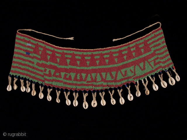 Pikuran (cache-sex),
Bana Guili people, Mandara Mountains, Cameroon.
Seed beads, cotton string, cowrie shells.
21" (53.5 cm) wide by 7.25" (18.4 cm) high.
Mid 20th century.
These colorful cache-sex were worn for celebrations, rituals and rites of  ...