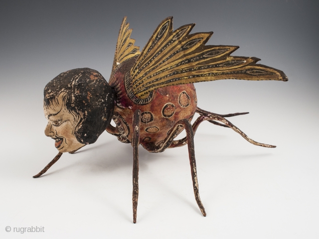 Alebrije,
Mexico City.
Paper mache over wire armature, paint,
Early to mid 20th century,
9" (23 cm) high by 15" (38 cm) long by 16" (40.5 cm) wide,
Ex. Fred and Nancy Roscoe collection, California. 	

This haunting  ...