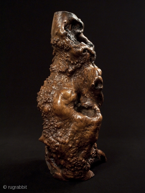 Burl candle stand,
Japan.
Burl wood.
17" (43 cm) tall.
Early to mid-20th century.
The hole in the top is 6" deep; this piece has been waxed.           