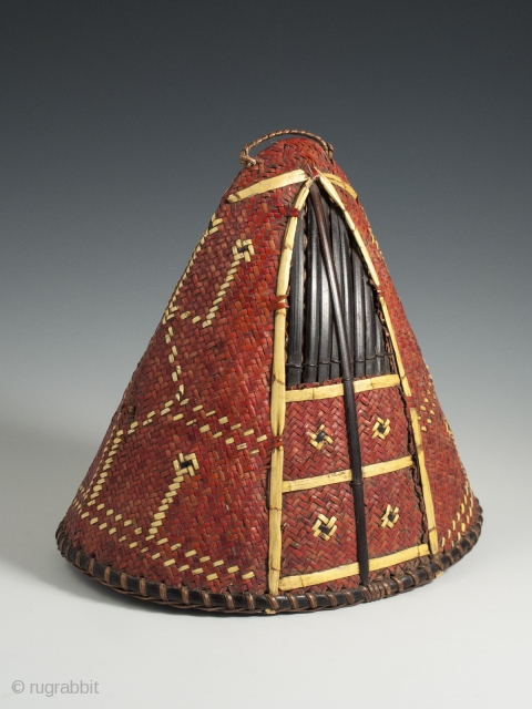 Hat, Naga People, Kalyo-Kengyu eithnic group, Northeastern India. Cane, orchid straw, 8″ (20 cm) high by 8.25″ (21 cm) by  5.5" (14 cm). A red-dyed woven cane conical-shaped warrior's hat has  ...