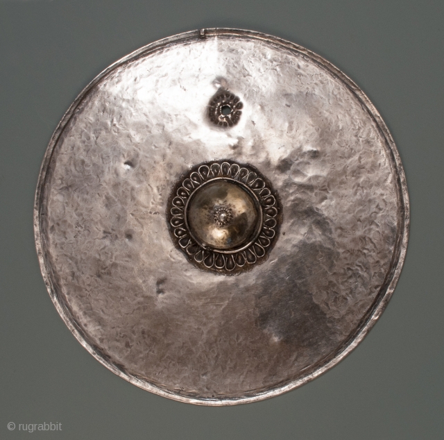 Pectoral,
Timor Island, Indonesia.
Silver, gilding.
Late 19th to early 20th century.
6" (15.2 cm) in diameter.                    