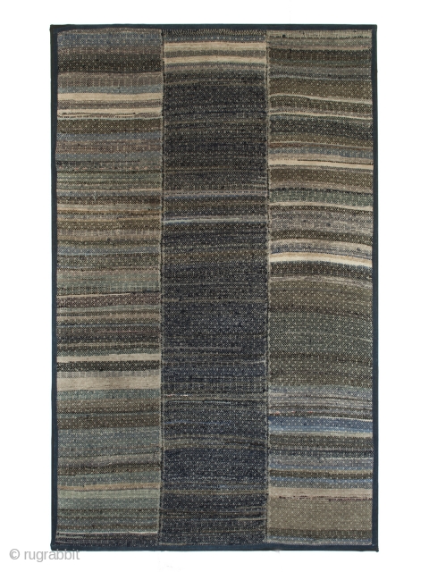 Blanket, Miao ethnic group, Guizhou Province, Southwest China. 71" (22.8 cm) high by 45" (7.6 cm) wide. Early 20th century.
This strip woven blanket is made from recycled fabrics, most of them indigo  ...