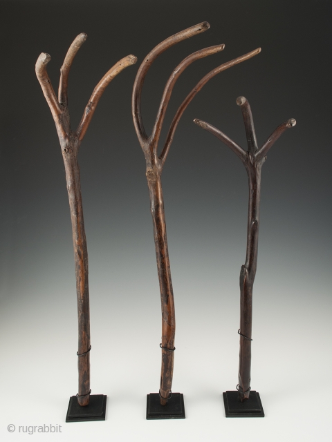 These wonderful wood rakes from Bhutan see to have a life of their own. 18" (45.7 cm) to 21" (53.4) high, early to mid 20th century. The rake on the far right  ...