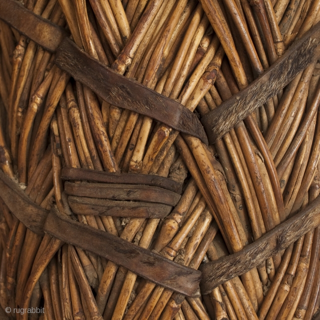 War shield,
Paduko tribe, Chad, Central Africa.
Reed, hide,
42" (106.7 cm) by 6.5" (16.5 cm)
c. 1900
Custom metal wall mount included.
Ex Fifi White, California.            