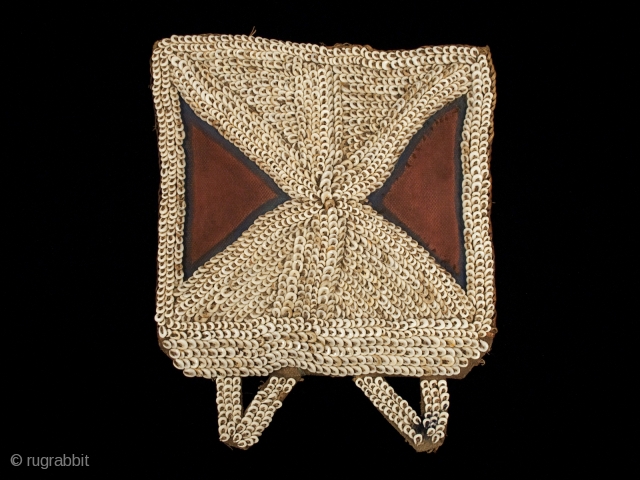 Poli currency. Kabum Valley, Morobe Province, Papua New Guinea. Nassa shells, burlap, fiber, pigments. 11” (28 cm) wide by 13” (33 cm) high. Early to mid-20th century      