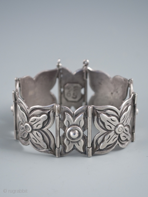 Silver bracelet,
Taxco, Mexico
Silver marked TAXCO 980
68 grams, 7" (17.8 cm) interior circumference and 1 1/8" (2.8 cm) wide
Pre 1940              