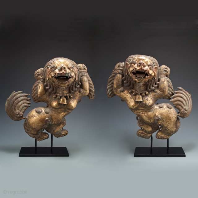 Snow lion plaques,
Tibet.
Copper, pigment, gilding.
Each measures 13" (33 cm) high by 15" (38 cm) wide.
Late 18th to 19th century.              