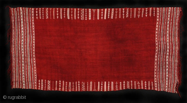 This wool baknough is from the village of Chenini, Tunisia. It has a glorious cochineal-colored field with intricate woven cream and black cotton designs. It has some damage on the fringe edges,  ...