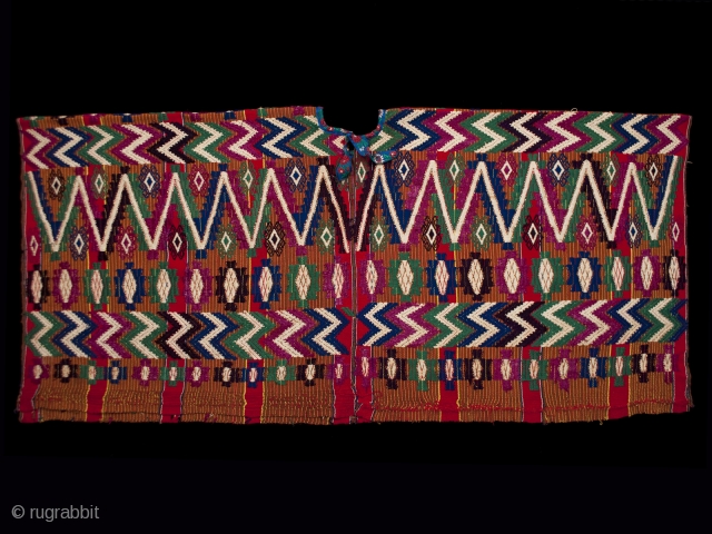 Ceremonial huipil (blouse),
Tecpan village, Guatemala.
Cotton, silk.
1970s or 80s.
51" (129.5 cm) wide by 23.5" (59.7 cm) high.
Ex. private San Francisco collection

The hand-spun cotton threads used for the body of this large huipil are  ...