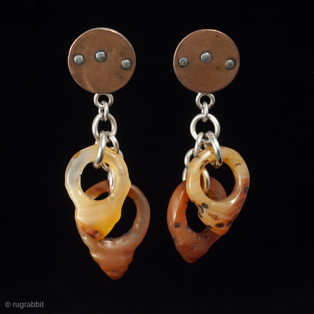 Vintage Agate and Silver Earrings by Jewels. Four rare hair ornaments carved in agate, called tanfouk or talhakimt, drop from a copper and silver disk for a pair of lightweight earrings. These  ...