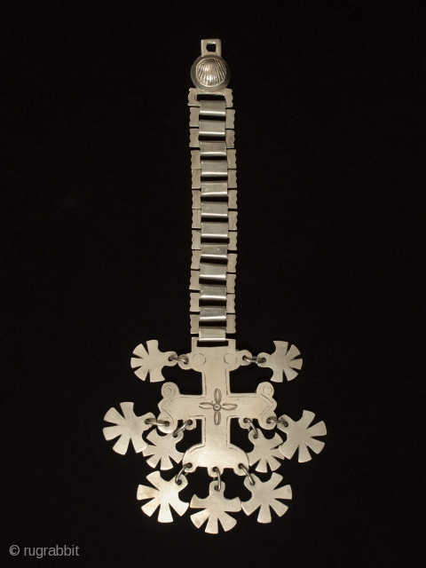 Trapelacucha pectoral, Mapuche, Chile. Nickel silver. 11" (28 cm) high by 4" (10 cm). Early to mid-20th century.               