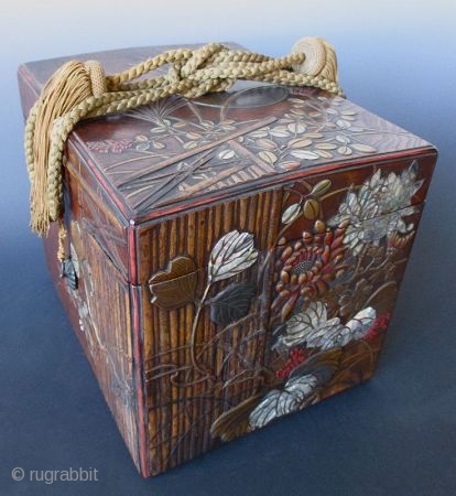 Japanese Antique Lacquered Keyaki Box with Garden Gate and Moon
An Exquisite antique Japanese large box made of keyaki (elm) wood burl and decorated with a design of a bamboo garden gate, tall  ...