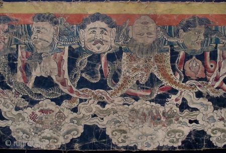 Antique Nepalese Buddhist Ceremonial Thangka Fragment
A long Buddhist Thangka fragment, the top corners with remnants of the fixtures once used for hanging. One side of the cloth is painted with hanging human  ...