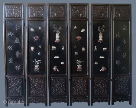 Chinese 6-panel Coromandel Hardwood Screen with Inlaid Jade
Antique Chinese 6-panel coromandel screen made of hardwood, possibly zitan. Inlaid with scholar items carved of various hardwoods and jade. All panels fit together with  ...