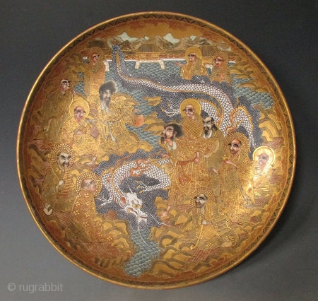 Japanese Antique Satsuma Bowl with Dragon


Beautiful Japanese Satsuma ware plate, decorated with a scene of a dragon surrounded on all sides by 14 Arhats standing on golden outcroppings of rock, the white  ...