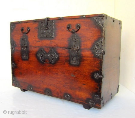 Antique Korean Bandagi Chest

A rustic and simple Korean Bandagi chest made of elm wood. The exterior of the chest contains decorative iron fittings and handles. The interior of the chest contains three  ...