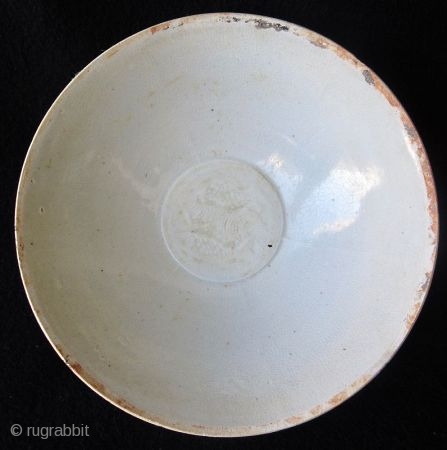 Antique Chinese Qingbai Bowl with Fish

Chinese qingbai porcelain bowl, egg shell thin body with pale celadon crackle glaze. The well of the bowl incised with two swimming fish over waves, the edges  ...