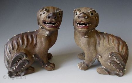 Pair of Chinese Antique Shiwan wear Fu-dogs

Antique Chinese pair of fu-dog (or fu-lions) hand made of Shiwan stonewear ceramic. Shiwan ware (Chinese: 石灣窯; pinyin: Shíwān yáo; Cantonese Jyutping: is Chinese pottery from  ...