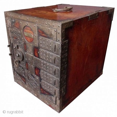 Antique Japanese Keyaki Fune Bako

Antique Japanese solid Keyaki (zelkova) hardwood fune bako or ship safe box. The front of the box has heavy iron plating with the number one (ichi) within a  ...