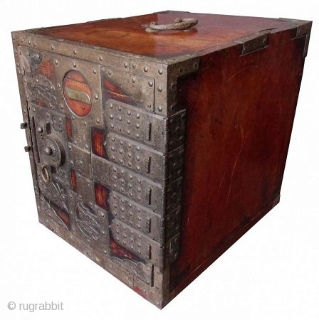 Antique Japanese Keyaki Fune Bako

Antique Japanese solid Keyaki (zelkova) hardwood fune bako or ship safe box. The front of the box has heavy iron plating with the number one (ichi) within a  ...