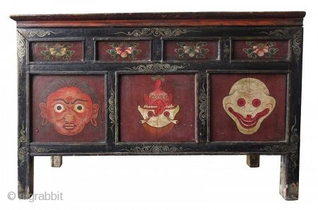 Rare 18th Century Tibetan Buddhist Painted Altar Cabinet

Rare Tibetan hand-painted lacquer altar cabinet. Original finish with patina. The front three panels depict three faces. The left face has red skin and green  ...