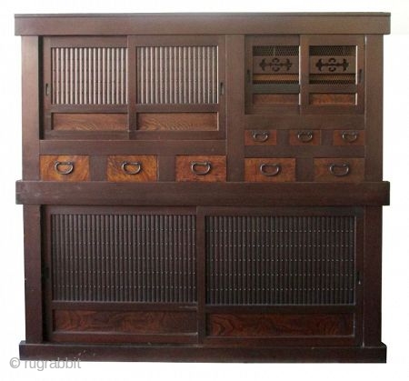 Antique Japanese 2 Section Mizuya



Japanese two section mizuya (kitchen tansu for storage). Constructed of Hinoki (cypress) wood frame with Sugi (cedar) wood, original dark finish. The top section holds a compartment behind  ...