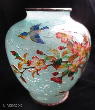 Stunning Japanese Antique Plique-a-jour Cloisonne Vase with Bird

Antique Japanese rare plique-a-jour cloisonne vase. This is a very early plique and in perferct condition. Intricate enamel design of a blossoming tree and a  ...