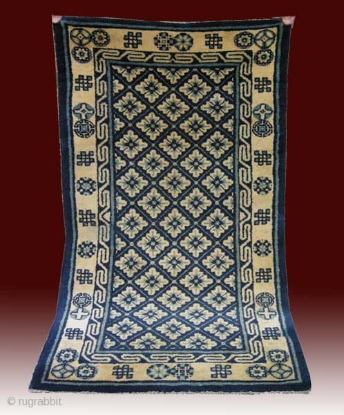 No.L20 * Chinese Rug . Origin: Baotou. Shape: Rectangle Age: About 100 Years Old Size: 66x127cm(26"x50"). Material: 100% Wool Woven: Hand-knotted Background Color: Off-whites,lvory. Flower lattice pattern in the field.The border with  ...