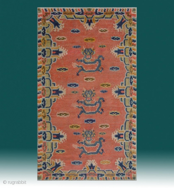 No.CL043 * Tibetan ? Antique "Dragon Face" Rug.Age: 20th Century.Size: 94x162cm ( 3'1" x 5'4" ).Origin: Tibetan Shape: Rectangle  Background Color: Oranges          