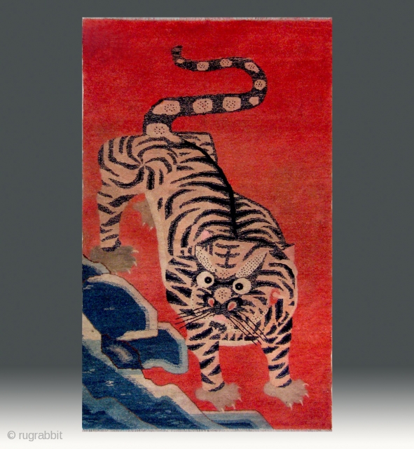 No.CL060 * Chinese Antique "Tiger " Rug.Age: Late 19th Century.Size: 100x162cm ( 3'3" x 5'4" ).Origin: Baotou-Suiyuan. Shape: Rectangle.Background Color: Reds. A heroic bearing tiger is setting off. This rug was probably  ...