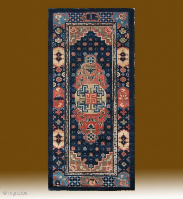 No.R156 * Chinese Antique "Medallion" Rug , Age:Late 19th Century.Size:75x152cm(2'6"x5'). Origin:Baotou-Suiyuan. Shape:Rectangle.Background Color:Blues.
This beautiful carpet from inner Mongolian features an interesting centre field design composed of a central medallion with a modified  ...