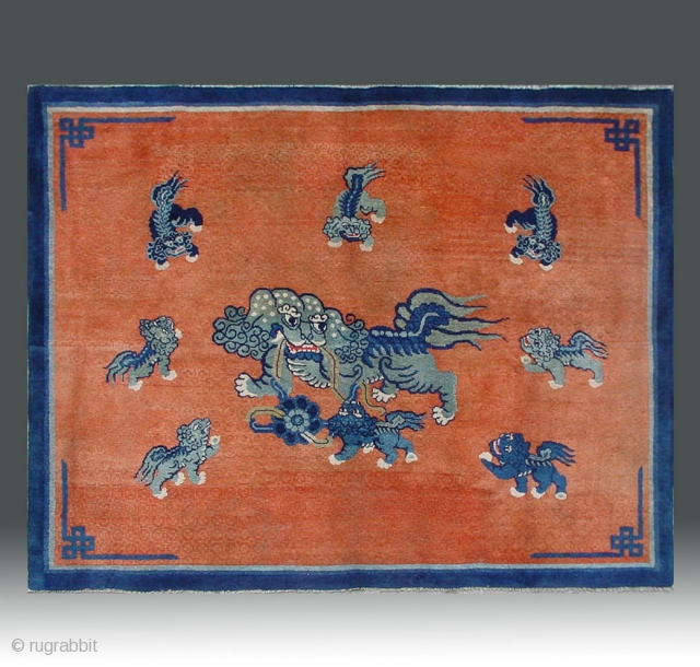 No.CL036 * Chinese Antique "Nine lions" Rug.Size: 147x182cm(4'10"x6').Age: Mid-19th CenturyOrigin: Baotou-Suiyuan.Shape: Rectangle.Background Color: Reds.
In the centre field a sitting Fo-dog is surrounded by eigh fo-dogs. The lion which is mythological animal has  ...