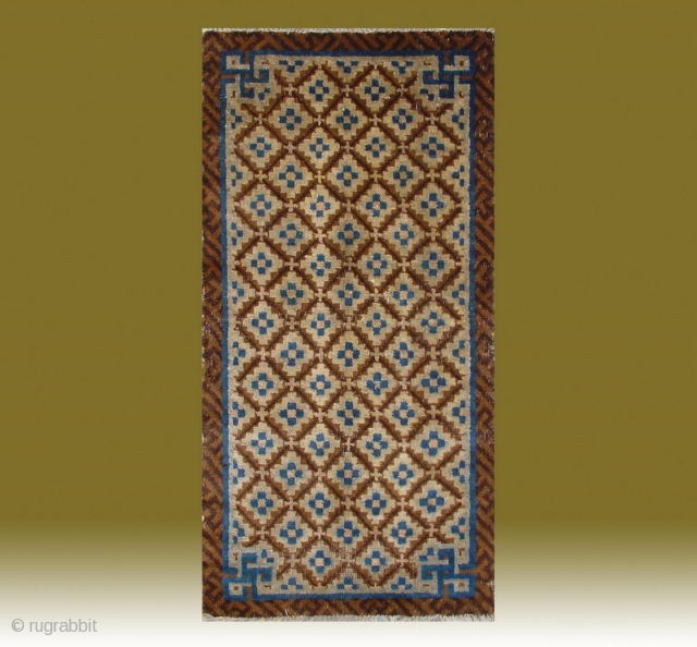 No.R040 * Chinese Antique Rug .Size: 51x100cm(1'9"x3'3").Origin: Baotou. Age: Early-19th Century.Shape: Rectangle.Background Color: Browns .The field is composed of a very nice flower lattice pattern. The rug was woven in classic brown  ...